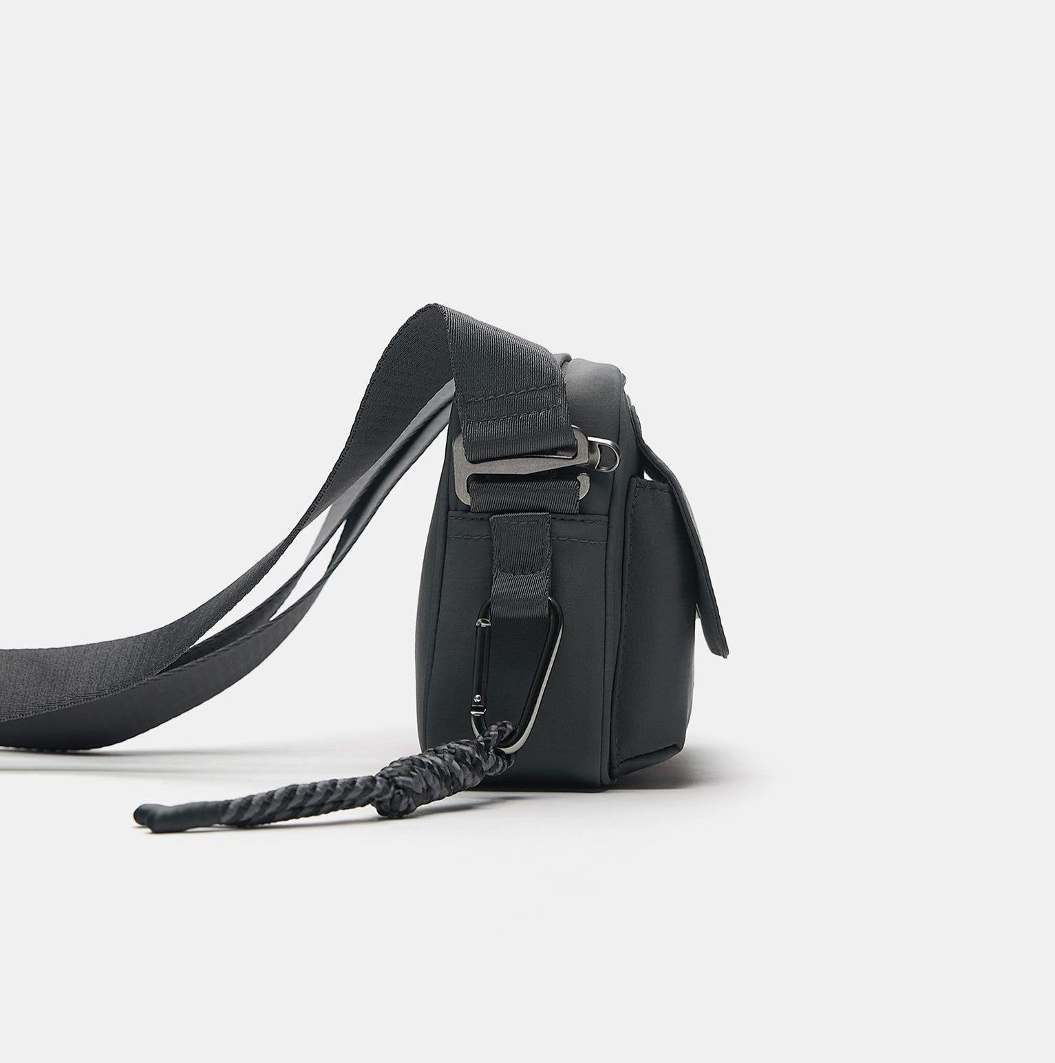 Charcoal Grey Black Compact Flap Bag with Braided Charm Detail and Adjustable Strap