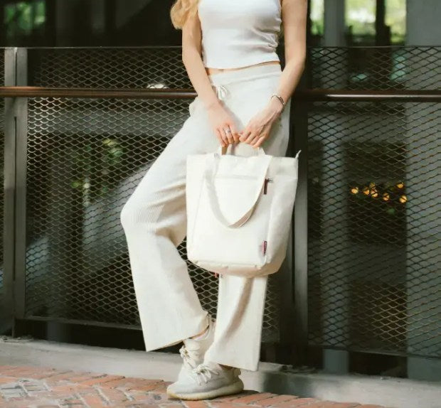 Off-White Minimalist Multi-Use Tote Bag with Front Zip Pocket and Trolley Sleeve