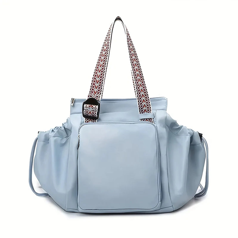 Pastel Blue Spacious Drawstring Tote Bag with Patterned Adjustable Strap