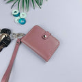 Muted Pink Compact Keychain Wallet with Card Slots and Wrist Strap